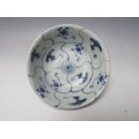 A CHINESE TEK SING CARGO BLUE AND WHITE BOWL WITH LOTUS DECORATION, retaining Nagel Auctions label