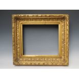 A 19TH CENTURY GOLD FRAME WITH LEAF DESIGN TO INNER EDGE, and acanthus leaf design to outer edge,