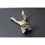A GILT BRONZE STYLE FIGURE OF A BOY LOUNGING ROUND, W 12.5 cm