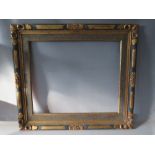 AN EARLY 20TH CENTURY GOLD AND BLUE DECORATIVE FRAME, with slip, frame W 6 cm, frame rebate 65 x