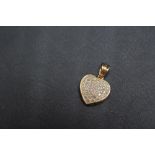 A HALLMARKED 9 CARAT GOLD DIAMOND CLUSTER HEART SHAPED PENDANT, approx weight 3.5g, H 2.5 cm