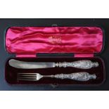 A CASED HALLMARKED SILVER HANDLED KNIFE AND FORK SET BY FRANCIS HIGGINS II - LONDON 1858, case W
