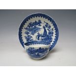 AN 18TH CENTURY WORCESTER FISHERMAN PATTERN TEA BOWL AND SAUCER, saucer Dia. 18 cm