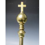 A POLISHED BRASS ECCLESIASTICAL CROSS ON ORB PROCESSIONAL STAFF, marked The Evangelist Church of