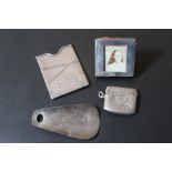 A HALLMARKED SILVER MINIATURE PHOTO FRAME, together with a small hallmarked silver vesta, a small