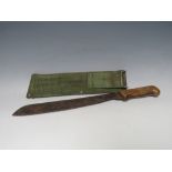 BRITISH MILITARY ISSUE ELWELL MACHETE NO KE18731 AND DATED 1953, with khaki fabric scabbard, blade L