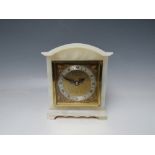 ELLIOTT FOR GARRARD & CO., a small white onyx mantel clock, square dial with silvered chapter ring