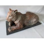 A VINTAGE COMPOSITE SCULPTURE OF A BENGAL TIGER, raised on a wooden base, inscribed, H 30 cm, L 59 c