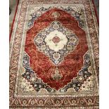 A 20TH CENTURY EASTERN RUG WITH FLORAL CENTRAL CARTOUCHE 231 X 156 CM