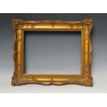 A 19TH CENTURY GOLD SWEPT FRAME, frame W 6.5 cm, rebate 28.5 x 38 cm