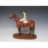 A BESWICK HORSE AND JOCKEY FIGURE OF ARKLE - PAT TAAFFE UP, matt finish, raised on an oval plinth