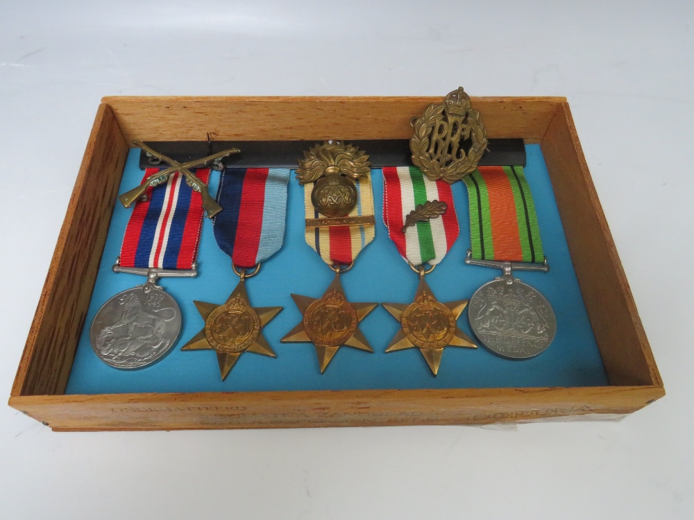 FIVE WORLD WAR II MEDALS TO INCLUDE THE 39-45 STAR, Africa Star, Italy Star, 39-45 medal and Defence - Image 2 of 5