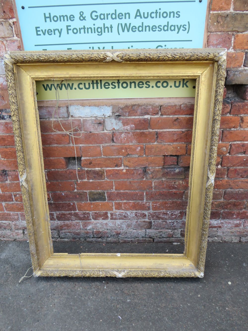 A 19TH CENTURY GILTWOOD RECTANGULAR PICTURE FRAME WITH ACANTHUS MOULDING, rebate 101 x 80 cm