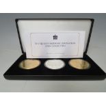 A CASED SET OF JUBILEE MINT THE QUEEN'S SAPPHIRE CORONATION COIN COLLECTION, three coins, with