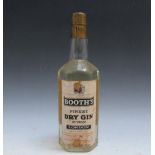 A VINTAGE BOTTLE OF BOOTH'S FINEST LONDON DRY GIN