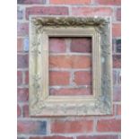 AN 18TH CENTURY DECORATIVE GOLD FRAME IN NEED OF SOME RESTORATION, frame W 9 cm, rebate 23 x 31 cm