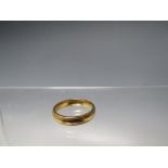 A HALLMARKED 18CT GOLD WEDDING BAND, ring size Q ½ / R, approximately 6.34 g