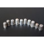 TEN SILVER THIMBLES TO INCLUDE A HALLMARKED CHARLES HORNER EXAMPLE - CHESTER 1901