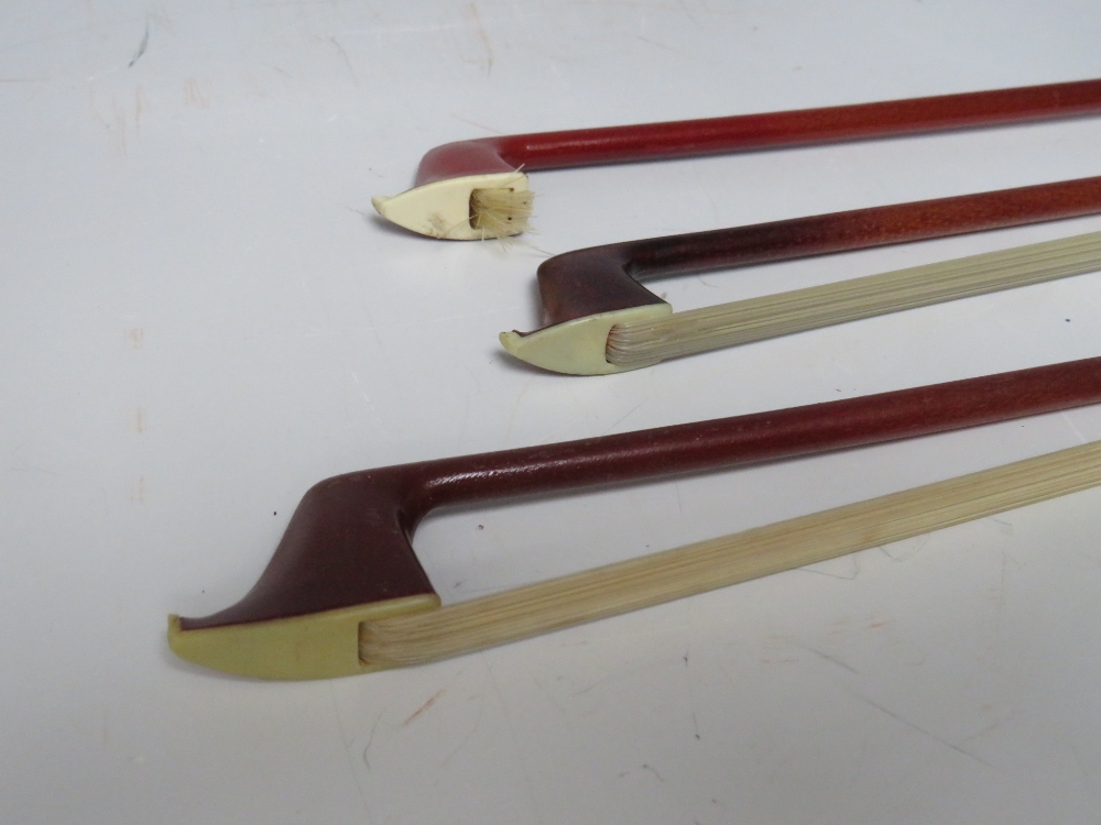 THREE GLASS FIBRE VIOLIN BOWS, one marked P H London, the other tow marked P & H LondonCondition - Image 5 of 7