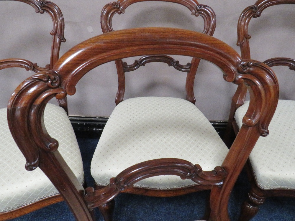 A SET OF SIX 19TH CENTURY ROSEWOOD CROWN BACK DINING CHAIRS, raised on shaped turned supports - Image 2 of 4