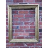 A 19TH CENTURY GOLD FRAME WITH INNER DESIGN, frame W 8.5 cm, rebate 69 x 53 cm