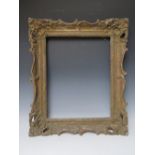 A LATE 19TH / EARLY 20TH CENTURY GOLD SWEPT FRAME, frame W 8.5 cm, rebate 41 x 57 cm