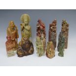 A COLLECTION OF ORIENTAL CARVED SOAPSTONE FIGURES / DEITIES, tallest H 23 cm (13)