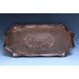 A WIDE COPPER TRAY, with decorative central vignette of a old copper mine and engine houses, hand