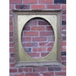 A 20TH CENTURY DECORATIVE GOLD SWEPT FRAME WITH OVAL GOLD SPANDREL, frame W 7.5 cm, spandrel site
