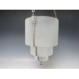 AN ART DECO THREE STAGE GRADUATED CHROME AND GLASS CEILING SHADE