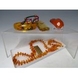 A COLLECTION OF VINTAGE AND MODERN AMBER & LUCITE JEWELLERY ETC., to include a vintage amber type