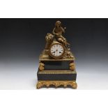 A FRENCH ORMULU STYLE CLOCK BY LARZET, decorated with a figure of a grape picker resting and playing