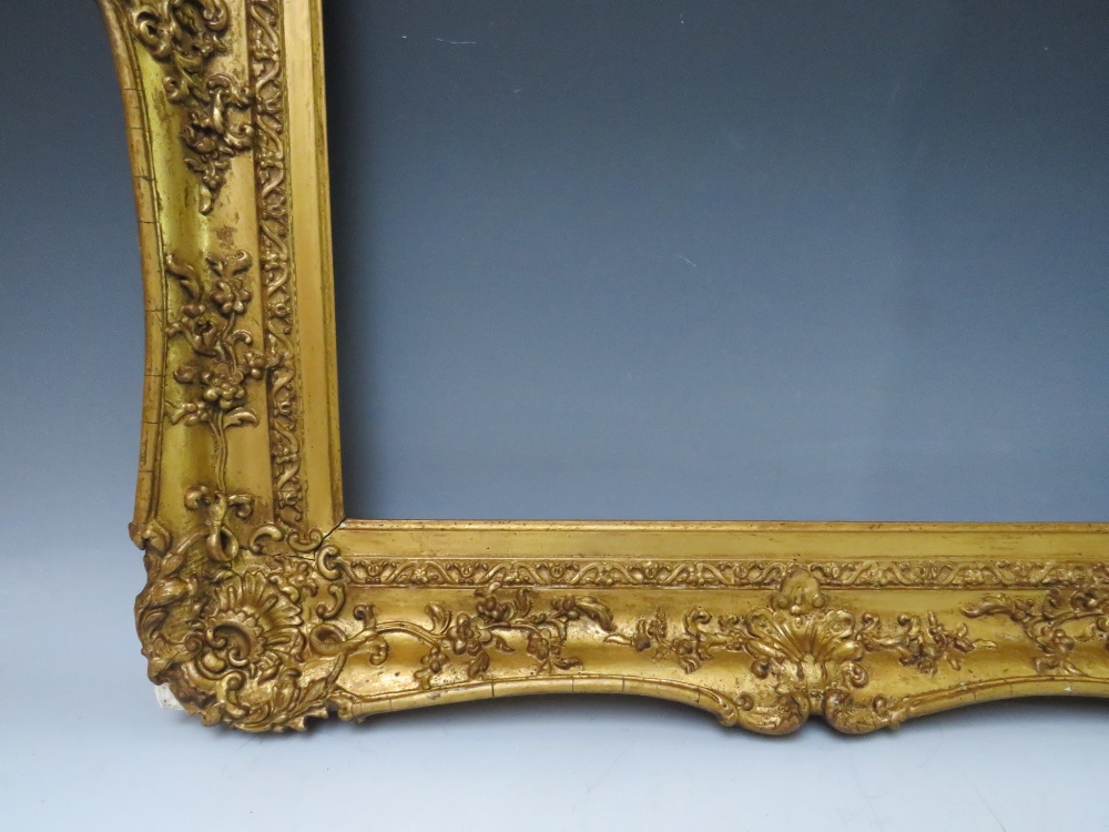 A 19TH CENTURY DECORATIVE GOLD SWEPT FRAME, frame W 9 cm, rebate 62 x 51 cm - Image 4 of 6