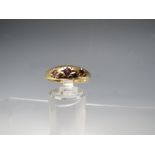 A HALLMARKED 9CT GOLD 3 STONE AMETHYST RING, ring size Q ½, approximate weight 2.1 g