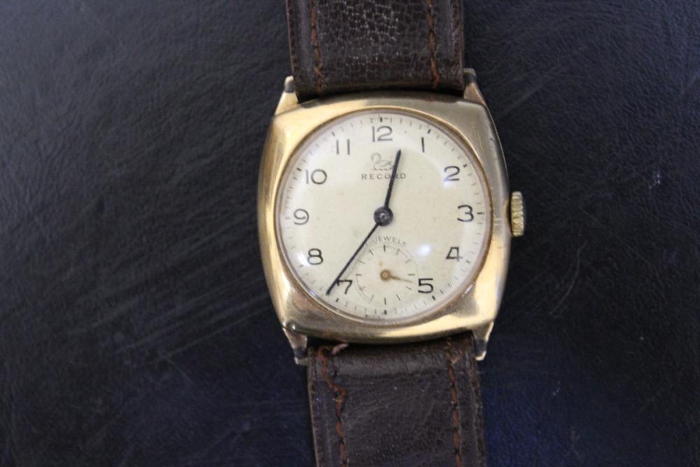A RECORD 9CT GOLD WRIST WATCH, on leather strap, with presentation engraving to reverse, Dia 3 - Image 2 of 3