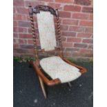 A 19TH CENTURY CARVED BARLEYTWIST FOLDING CHAIR, with modern and floral upholstered detail