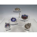 A COLLECTION OF FOUR EARLY 20TH CENTURY HALLMARKED SILVER AND ENAMEL FOOTBALL FOB MEDALS, comprising