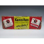 A VINTAGE ENAMELLED METAL ADVERTISING SIGN, for Kensitas fine cigarettes, 17 x 50.5 cm