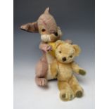 A VINTAGE MERRYTHOUGHT MUSICAL 'THUMPER' SOFT TOY, H 41 cm, together with a smaller vintage