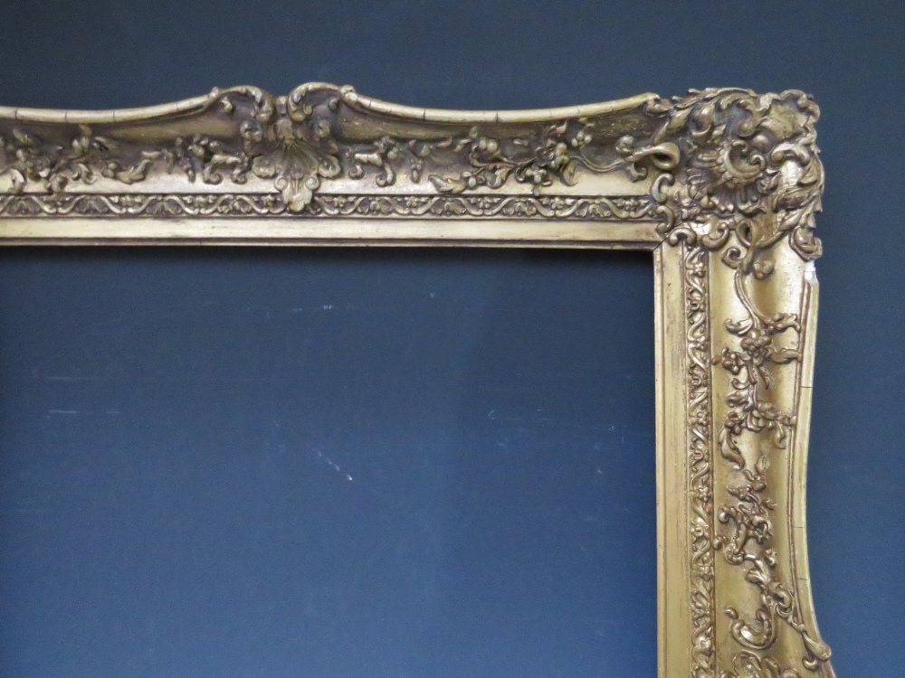 A 19TH CENTURY DECORATIVE GOLD SWEPT FRAME, frame W 9 cm, rebate 62 x 51 cm - Image 5 of 6