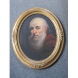 (XIX). an oval head and shoulder portrait study of a bearded priest, unsigned, oil on canvas laid on