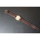 A VINTAGE 9 CT GOLD WRIST WATCH, on replacement leather strap, Dia 3 cmCondition Report: