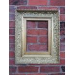 A 19TH CENTURY GOLD FRAME WITH INNER LEAF DESIGN, acanthus leaf design to outer edge and gold