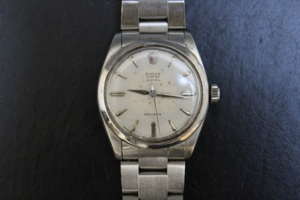 ROLEX - AN OYSTER ROYAL PRECISION WRIST WATCH, together with certificate, name engraved on back