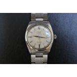 ROLEX - AN OYSTER ROYAL PRECISION WRIST WATCH, together with certificate, name engraved on back