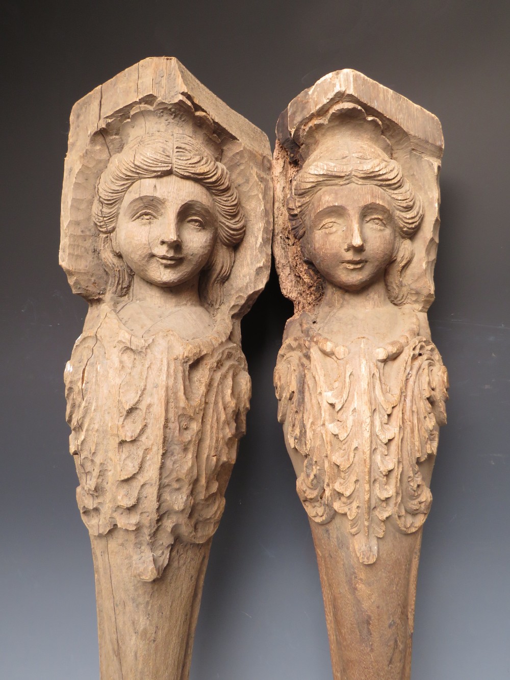 A PAIR OF LATE 17TH / EARLY 18TH CENTURY CARIATE TABLE LEGS A/F, with carved effigies of young - Image 2 of 7