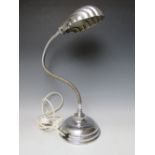 AN ART DECO CHROME SHELL ADJUSTABLE DESK LAMP, impressed to the base G E C