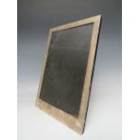 A LARGE LONDON HALLMARKED SILVER EASEL BACK PHOTO FRAME, overall H 35.5, W 25 cm, rebate approx.