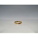 A HALLMARKED 22CT GOLD WEDDING BAND, ring size O / O ½, approximately 1.87 g