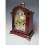 A MAHOGANY CASED WESTMINSTER CHIME MANTLE CLOCK, with hermle moon roller movement, H 30 cm